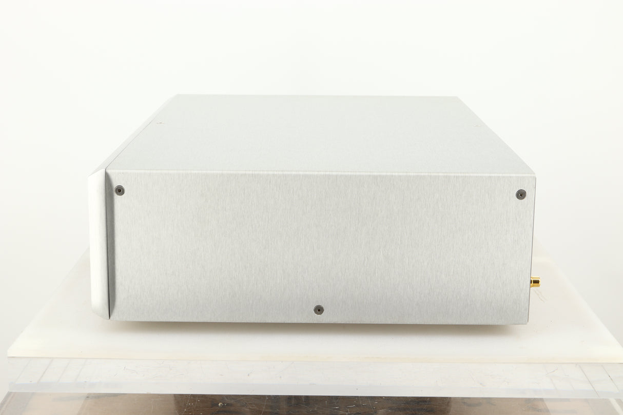 Side view of a used Ayre CX-7 CD Player in silver finish