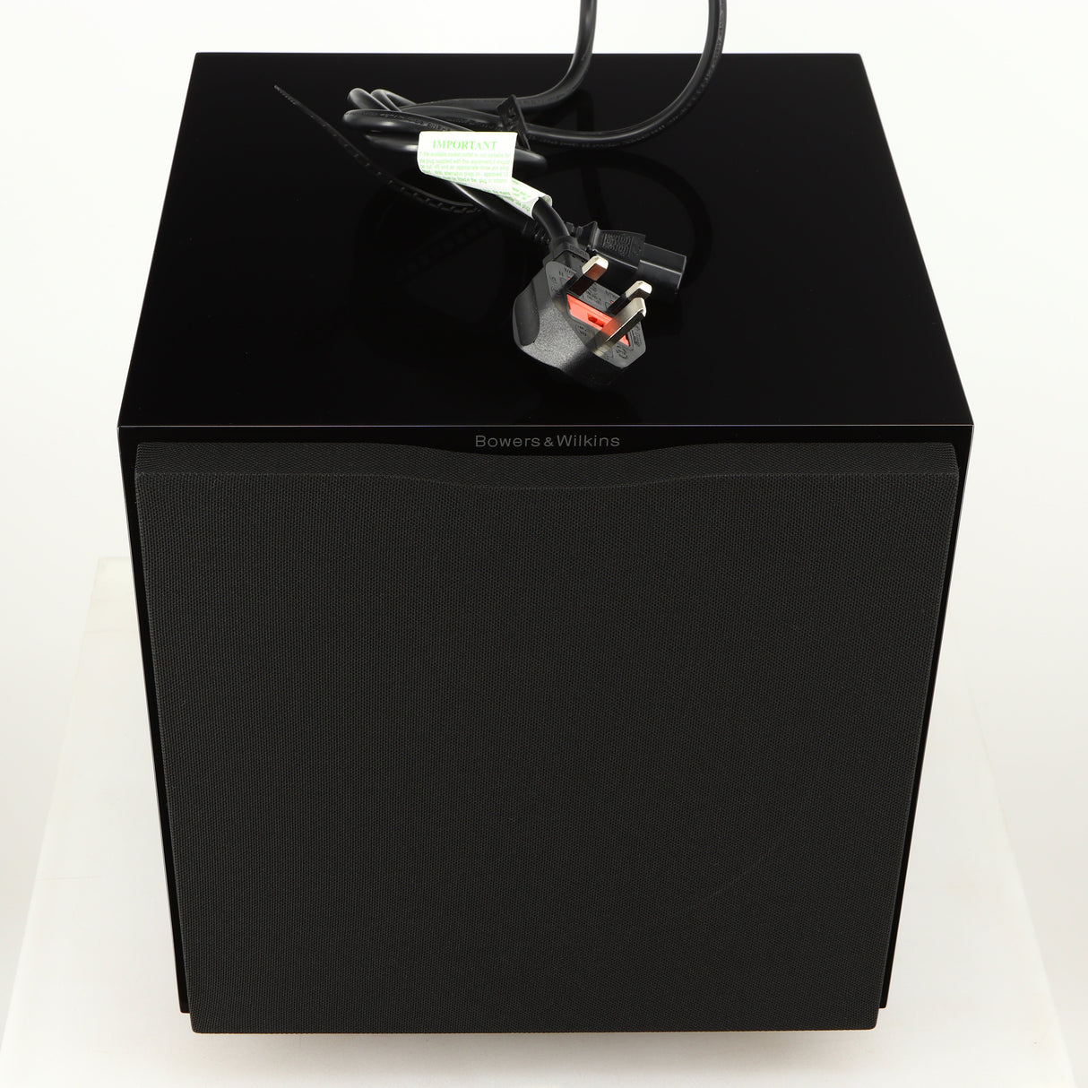 Top of a used B&W ASW10CM Subwoofer in a gloss black finish showing Mains Cable