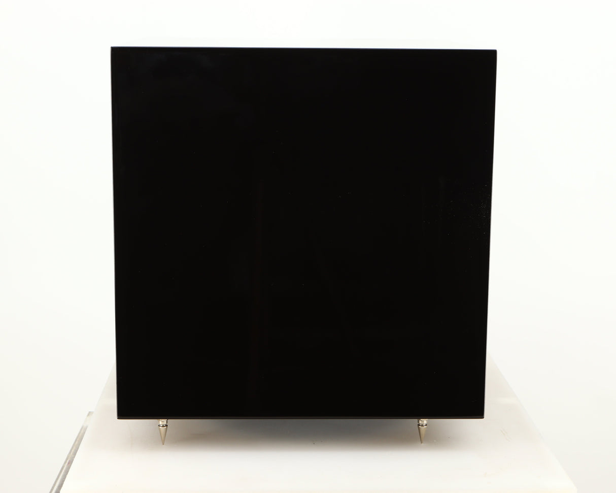 Right side view of a used B&W ASW10CM Subwoofer in a gloss black finish