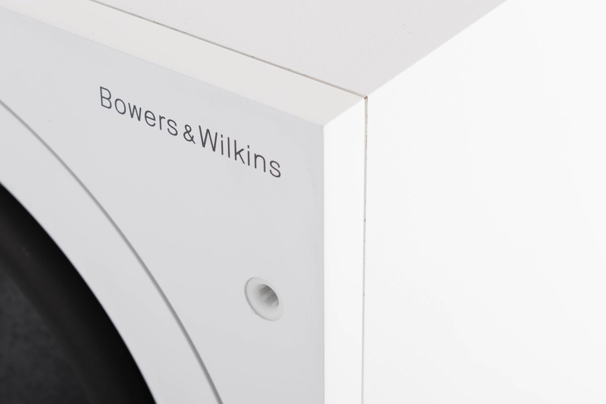 Close up of a used B&W ASW608 Subwoofer in a Matt White finish showing light mark on front right corner