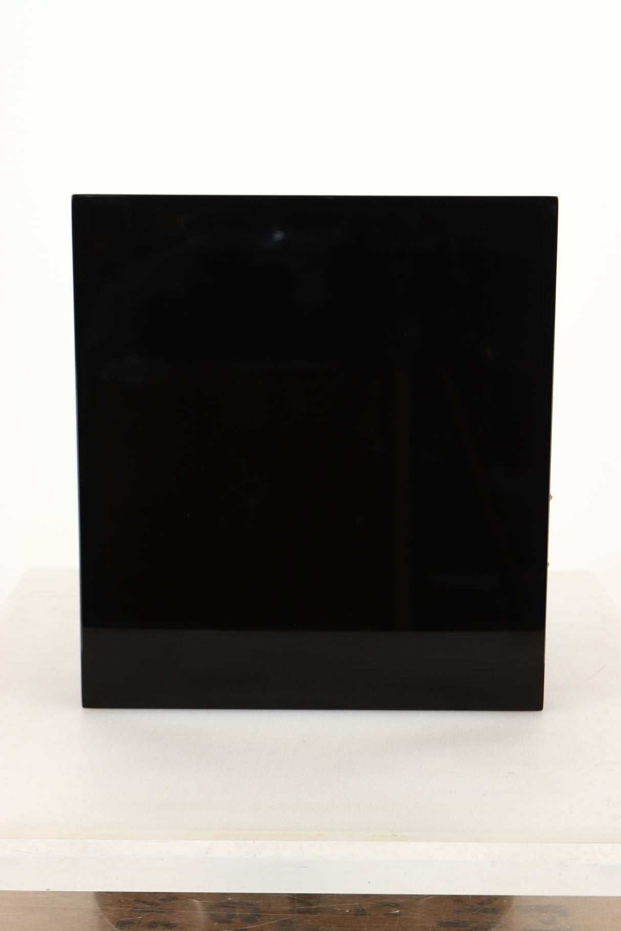 Side view of a used B&W CM1 Standmount Speaker in Gloss Black finish