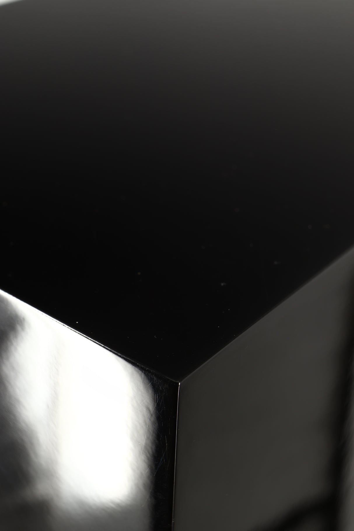 Close up of a used B&W CM9 S2 Floorstanding Speaker in a gloss black finish showing scratching on cabinet