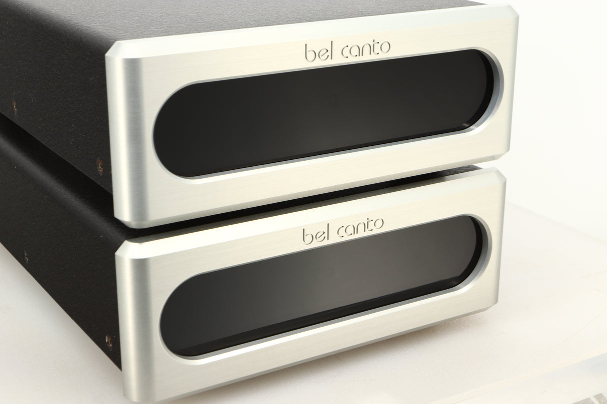 Close up view of a used pair of Bel Canto REF600M Monoblock Power Amplifiers in Silver finish