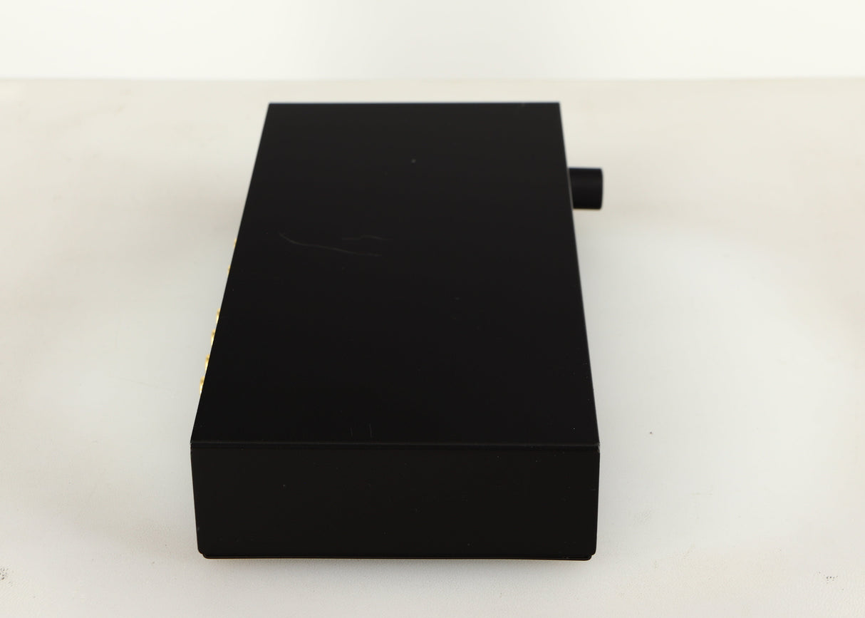 Left side view of a used Beresford TC7510 Digital Analogue Converter in a black finish