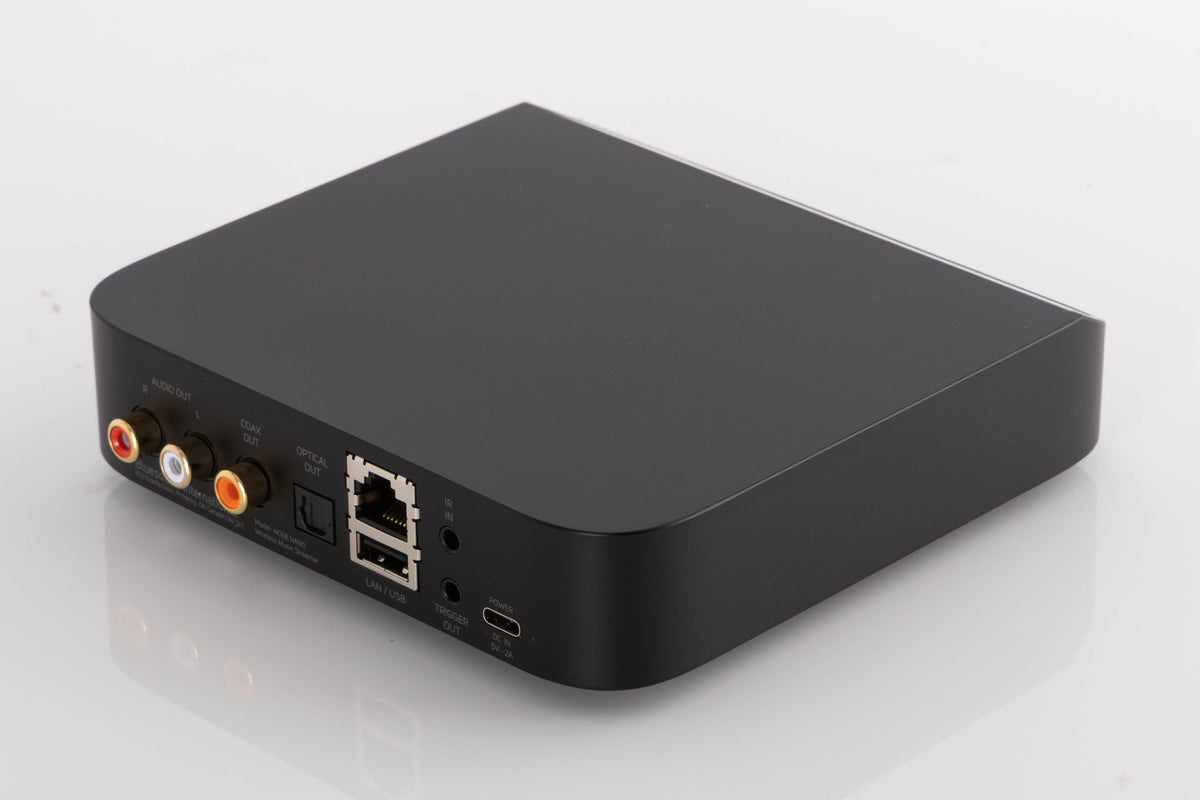 Rear left corner of a used Bluesound Node Nano Streamer in a Black finish
