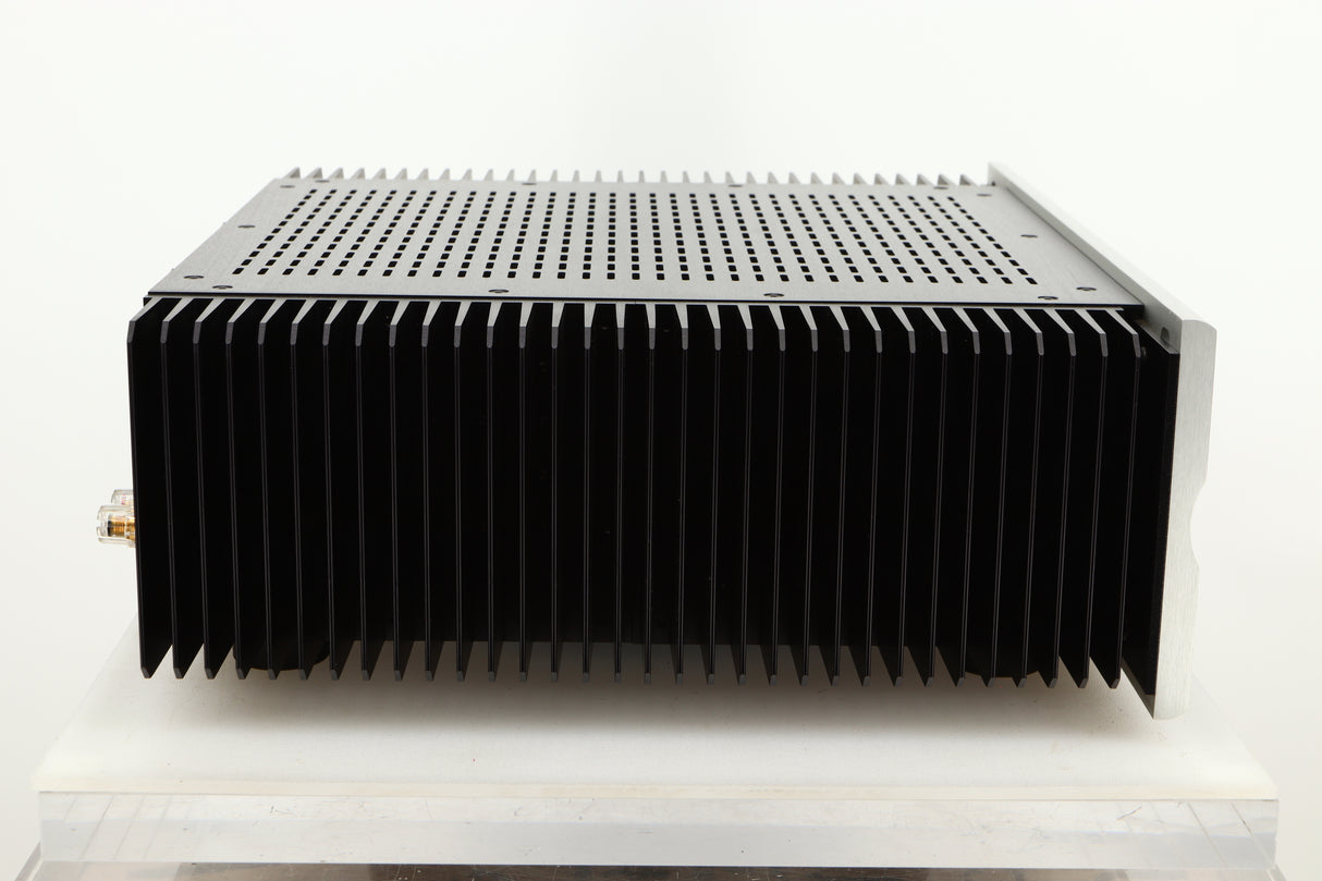 Side view of a used Bryston 4BSST2 Power Amplifier in Silver finish
