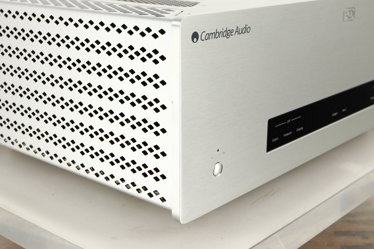Front left corner of a used Cambridge Audio 851W Power Amplifier in a silver finish