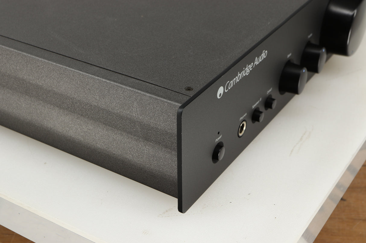 Front left corner of a used Cambridge Audio 340A Integrated Amplifier in a black finish