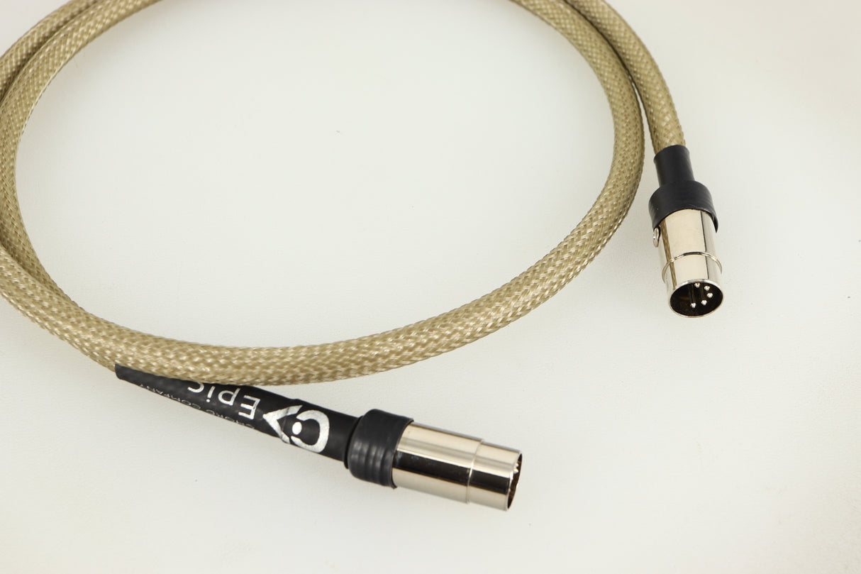Close up of a used Chord Company Epic Interconnect DIN-DIN Interconnect Cable 1.0m showing connectors