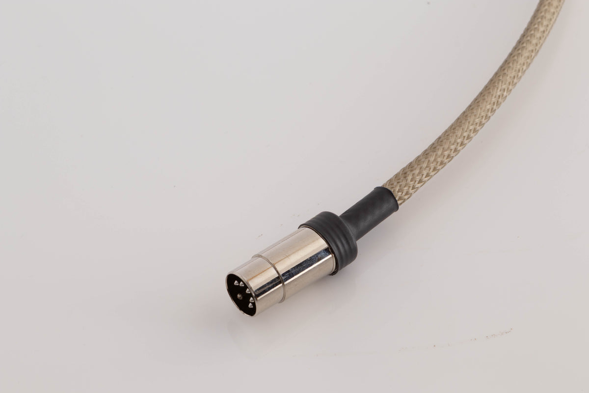 Close up view of a used Chord Company Epic X Aray 1.0m 2 RCA - Din Interconnect Cable