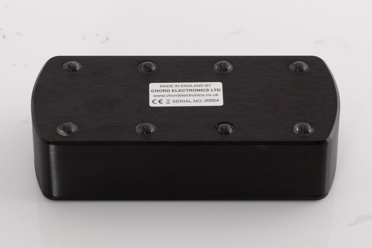 Underside of a used Chord Electronics Qute HD Digital Analogue Converter in a Black finish