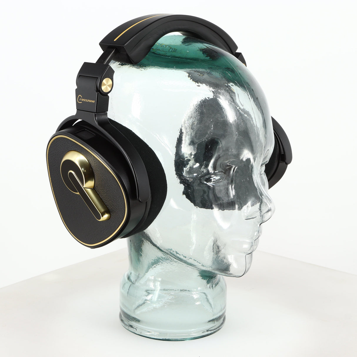 Front left angle of used Crosszone CZ-1 Headphones in a black / gold finish