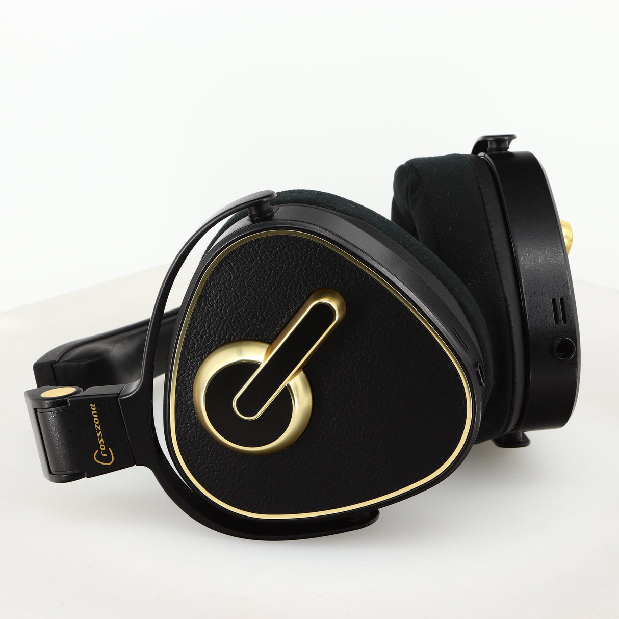 Underside of used Crosszone CZ-1 Headphones in a black / gold finish