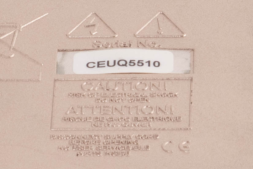 Close up of a used Cyrus CD8X CD Player in a Quartz Silver finish showing serial number