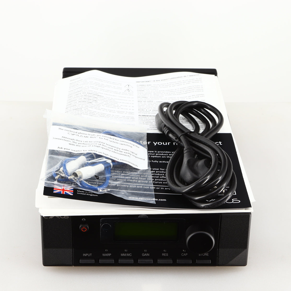 Top of a used Cyrus Classic Phono Phonostage in a brushed black finish showing Schuko Cable, Interconnect Cable and Manuals