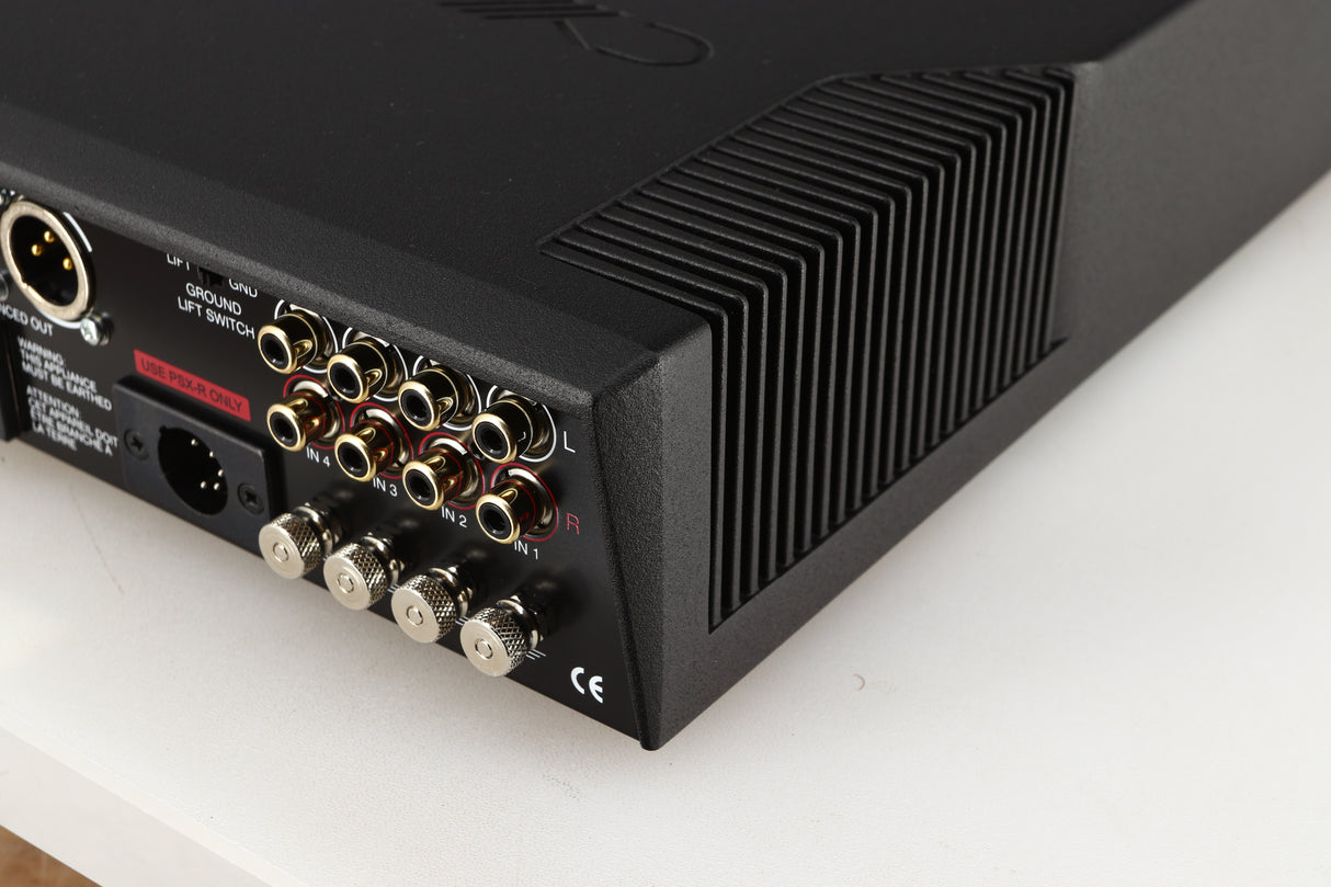 Rear left corner of a used Cyrus Classic Phono Phonostage in a brushed black finish