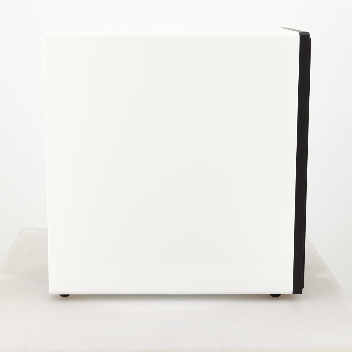 Left side view of a used Cyrus ONE Linear Standmount Speaker in a gloss white finish