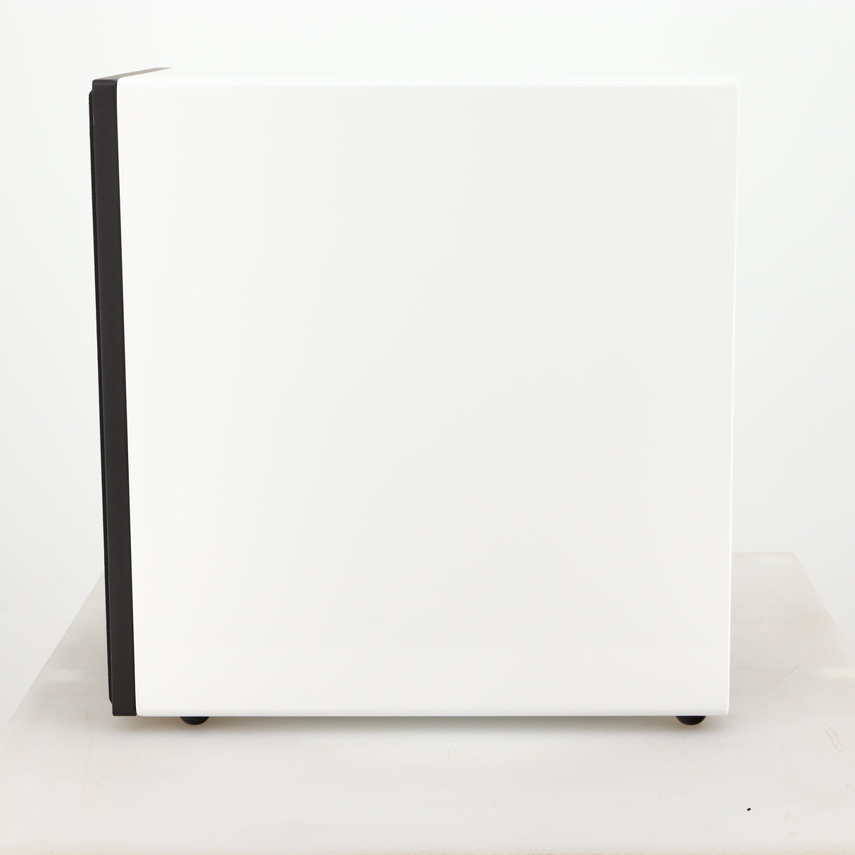 Right side view of a used Cyrus ONE Linear Standmount Speaker in a gloss white finish