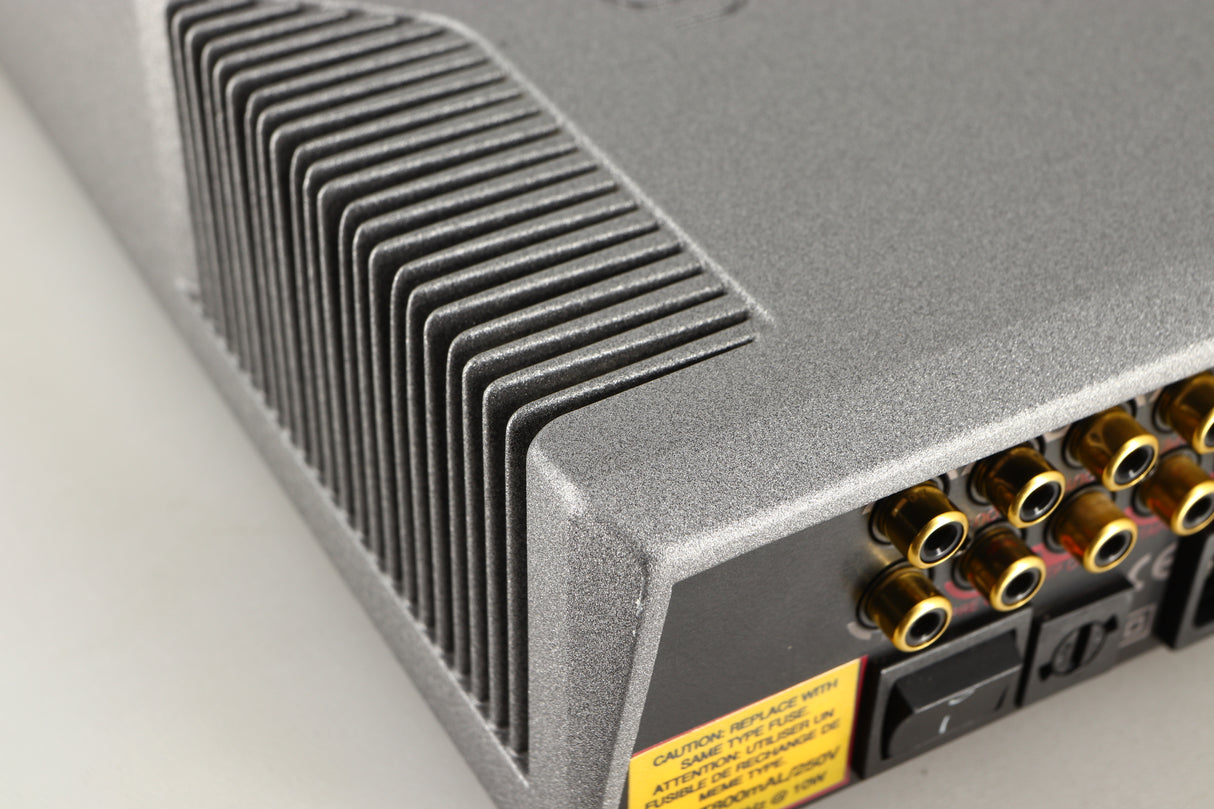 Close up of a used Cyrus PRE VS2 Pre Amplifier in a quartz silver finish showing small nick on rear right corner