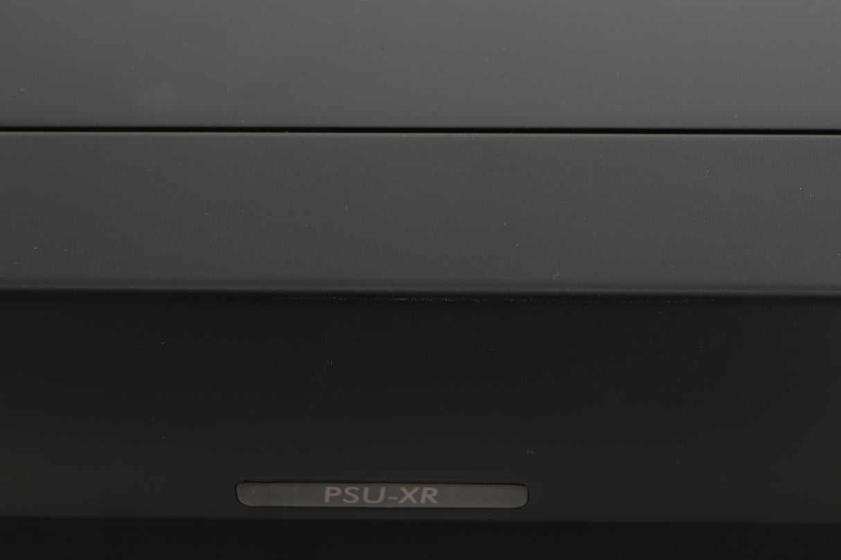 Close up view of a used Cyrus PSU-XR Power Supply in PhBlack finish showing a slight mark on the front edge