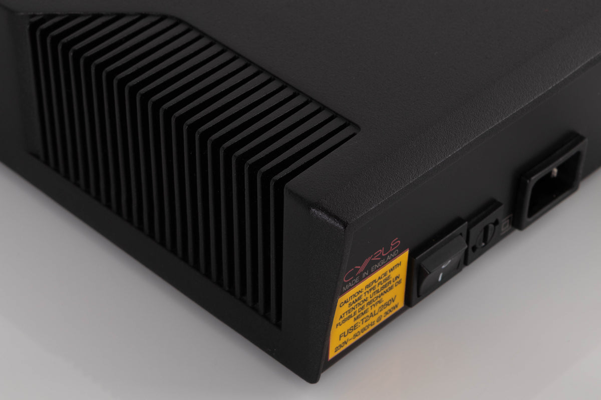 Rear right corner of a used Cyrus PSX-R2 Power Supply in a Brushed Black finish