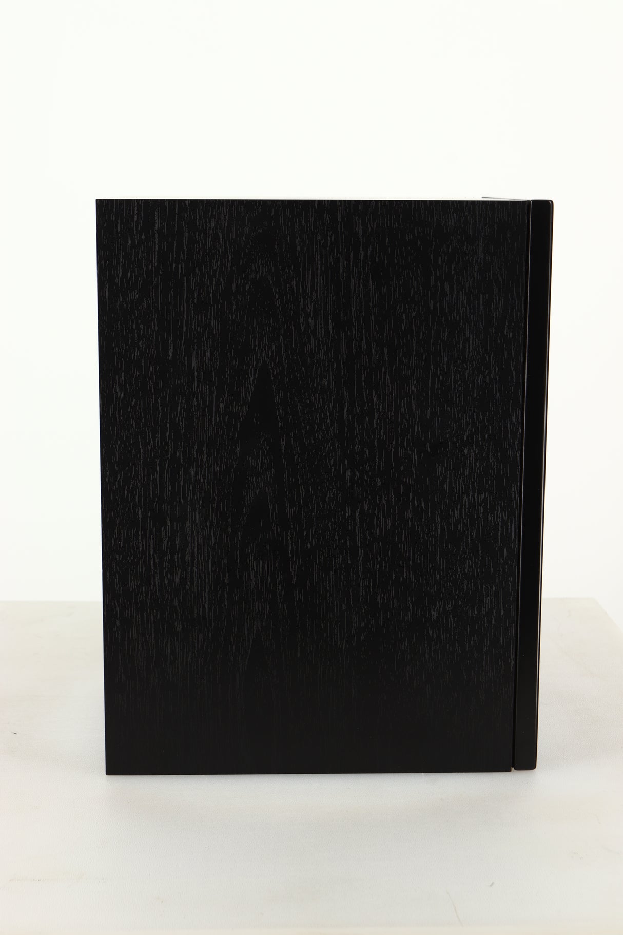 Side view of a used Dali Oberon 1C Active Standmount Speaker in Black finish