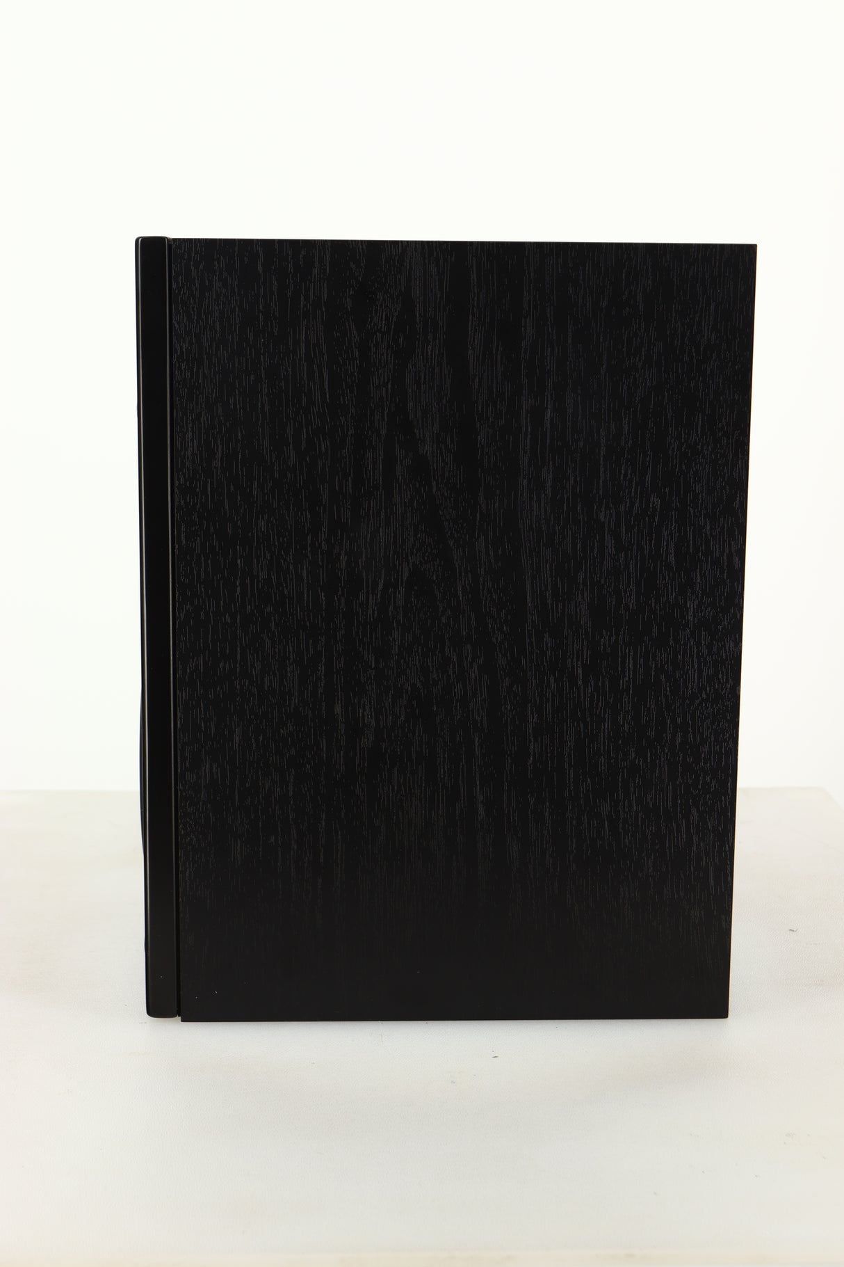 Side view of a used Dali Oberon 1C Active Standmount Speaker in Black finish