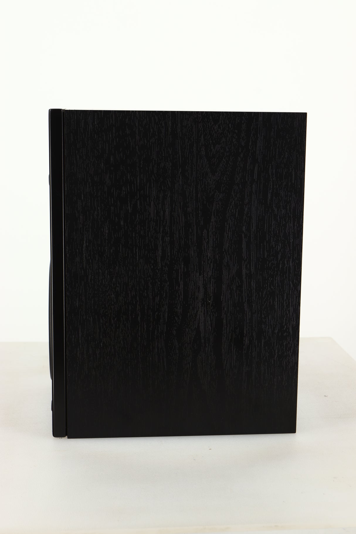 Side view of a used Dali Oberon 1C Active Standmount Speaker in Black finish
