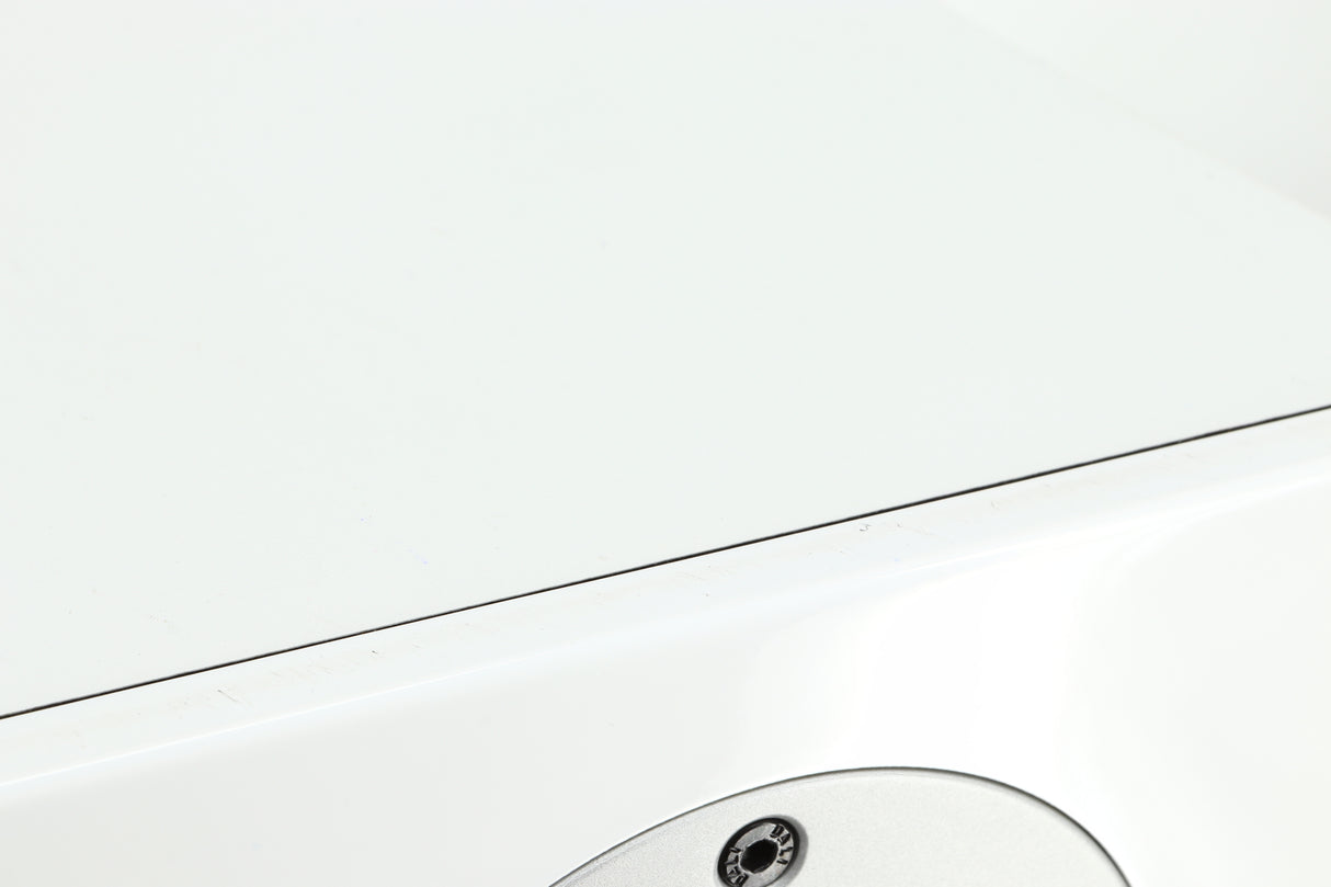Close up of a used Dali Zensor 3 Standmount Speaker in a satin white finish showing some scratching on the front top edge