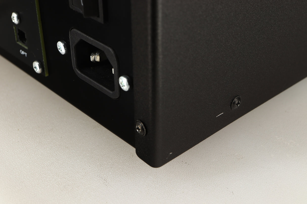 Close up of a used Deco Audio Transfer DAC in a black finish showing scratching on left side