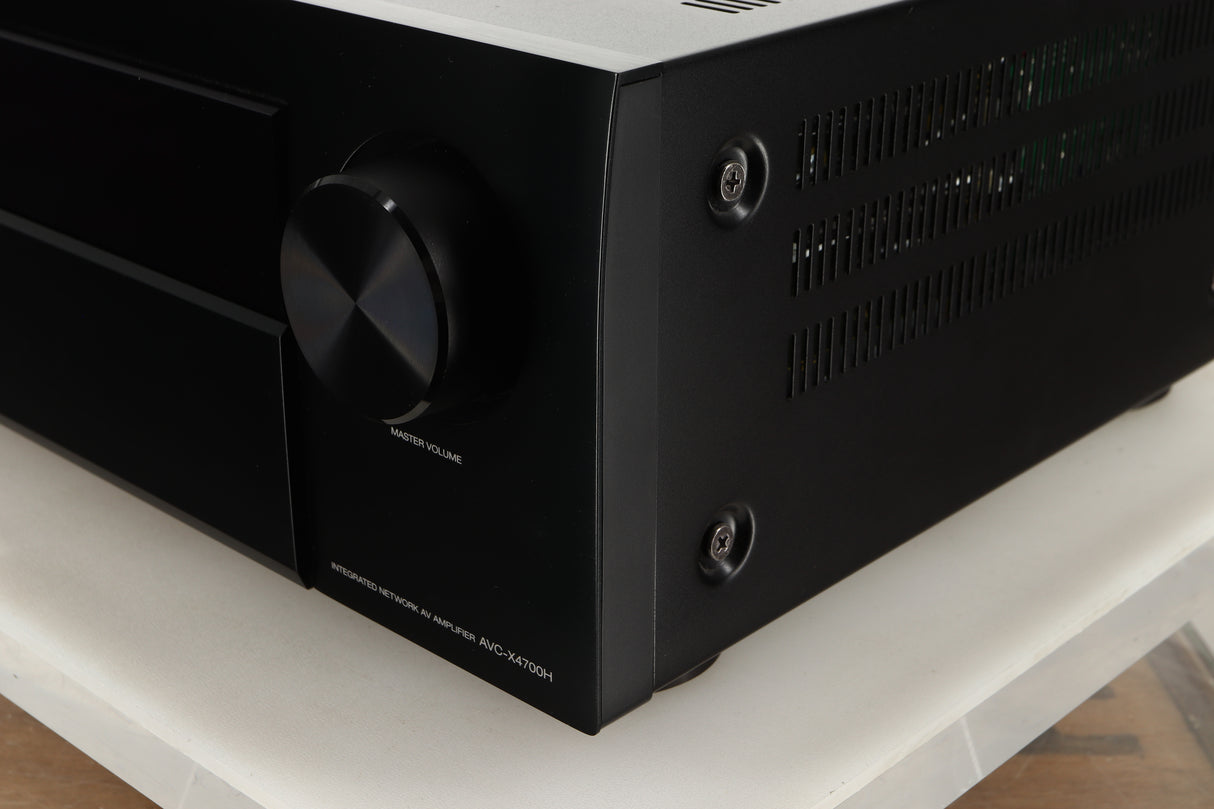 Front right corner view of a used Denon AVR-4700 AV Amplifier in Black finish