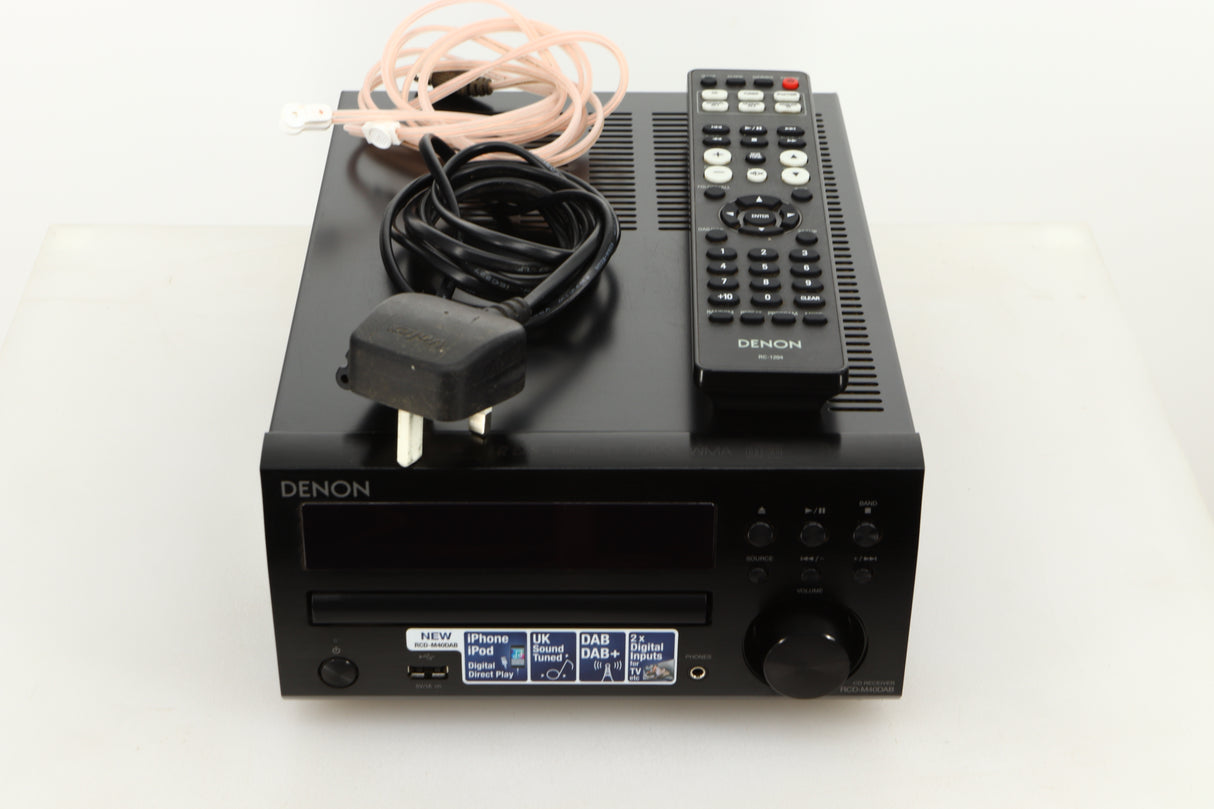 View of a used Denon RCD-M40DAB Mini System in Black finish showing Mains cable, Remote, and Aerial