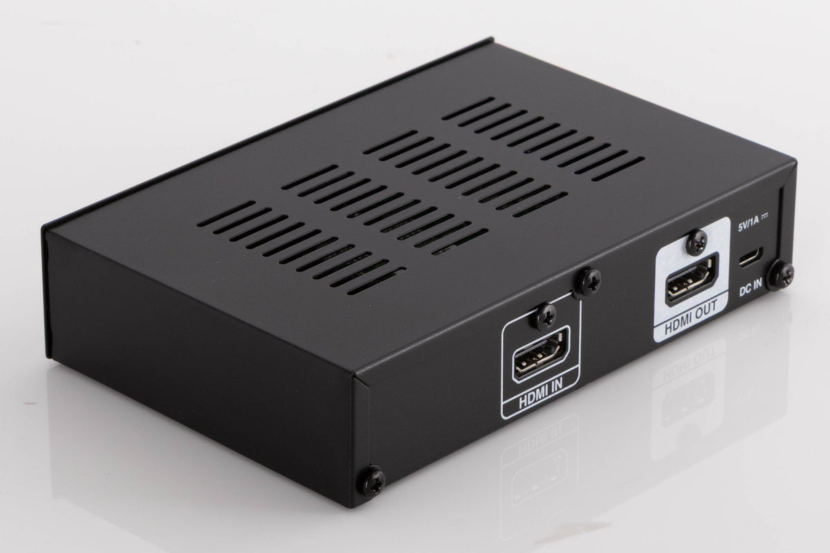 Rear right corner of a used Denon SPK618 HDMI Adaptor in a Black finish
