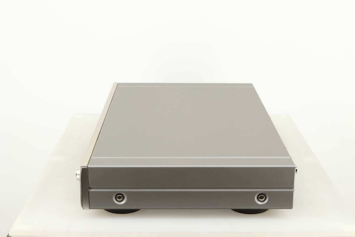 Right side view of a used Denon TU-1800 DAB/FM Tuner in a silver finish