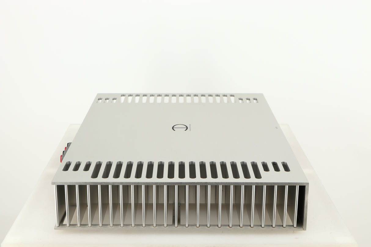 Left side view of a used Densen B350Plus Monoblock Power Amplifier in a silver finish