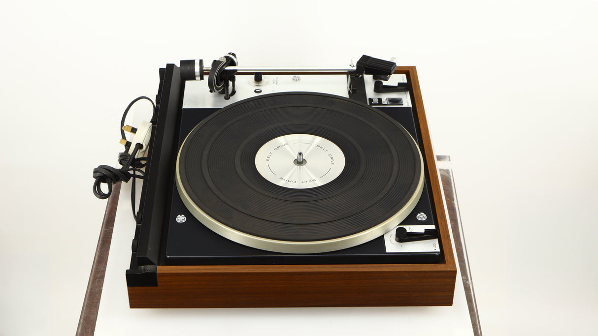 Left side view of a used Dual 601 Turntable / Goldring 1042 Cartridge in a walnut finish