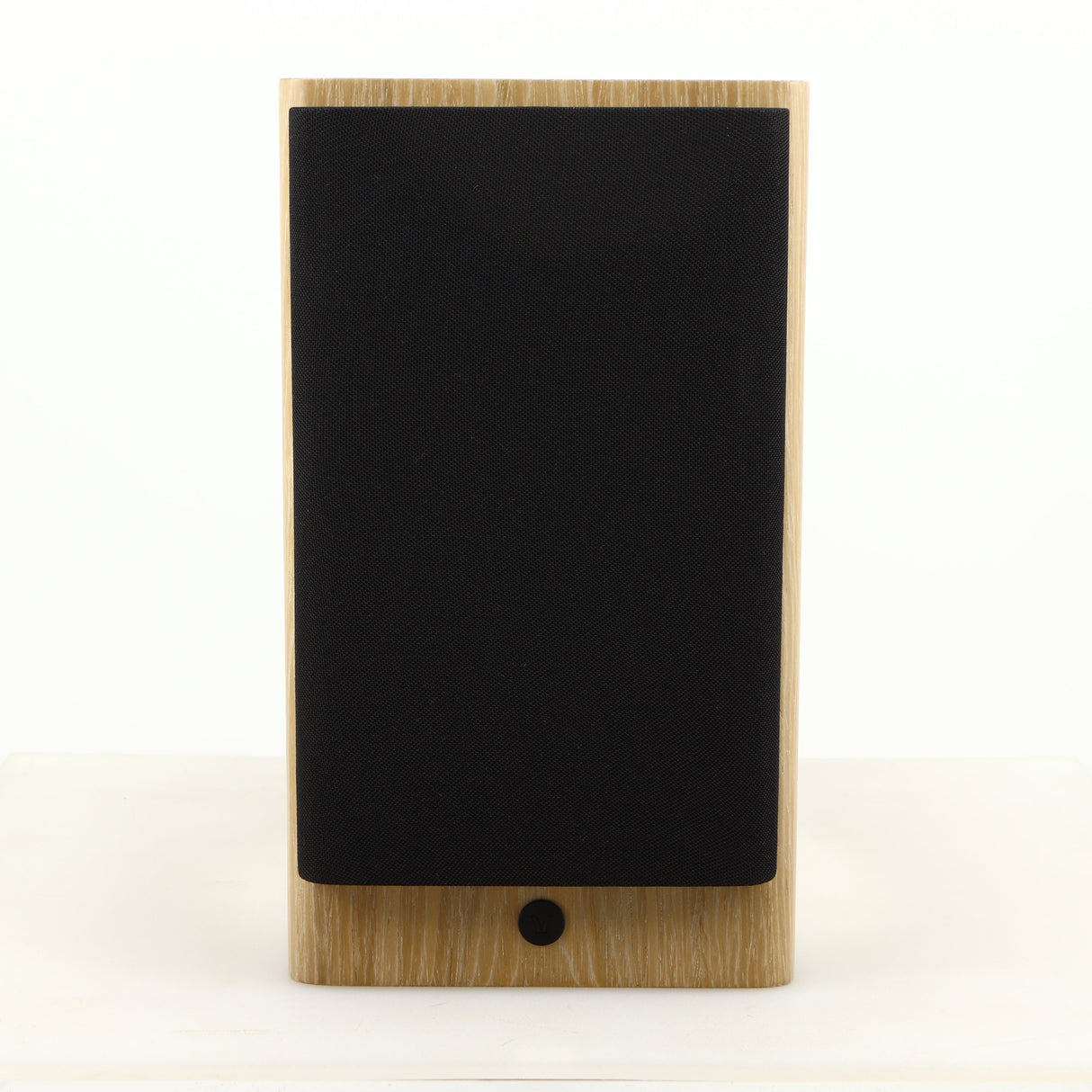 Front view of a used Dynaudio Focus 10 Standmount Speaker in a blonde finish showing Grille