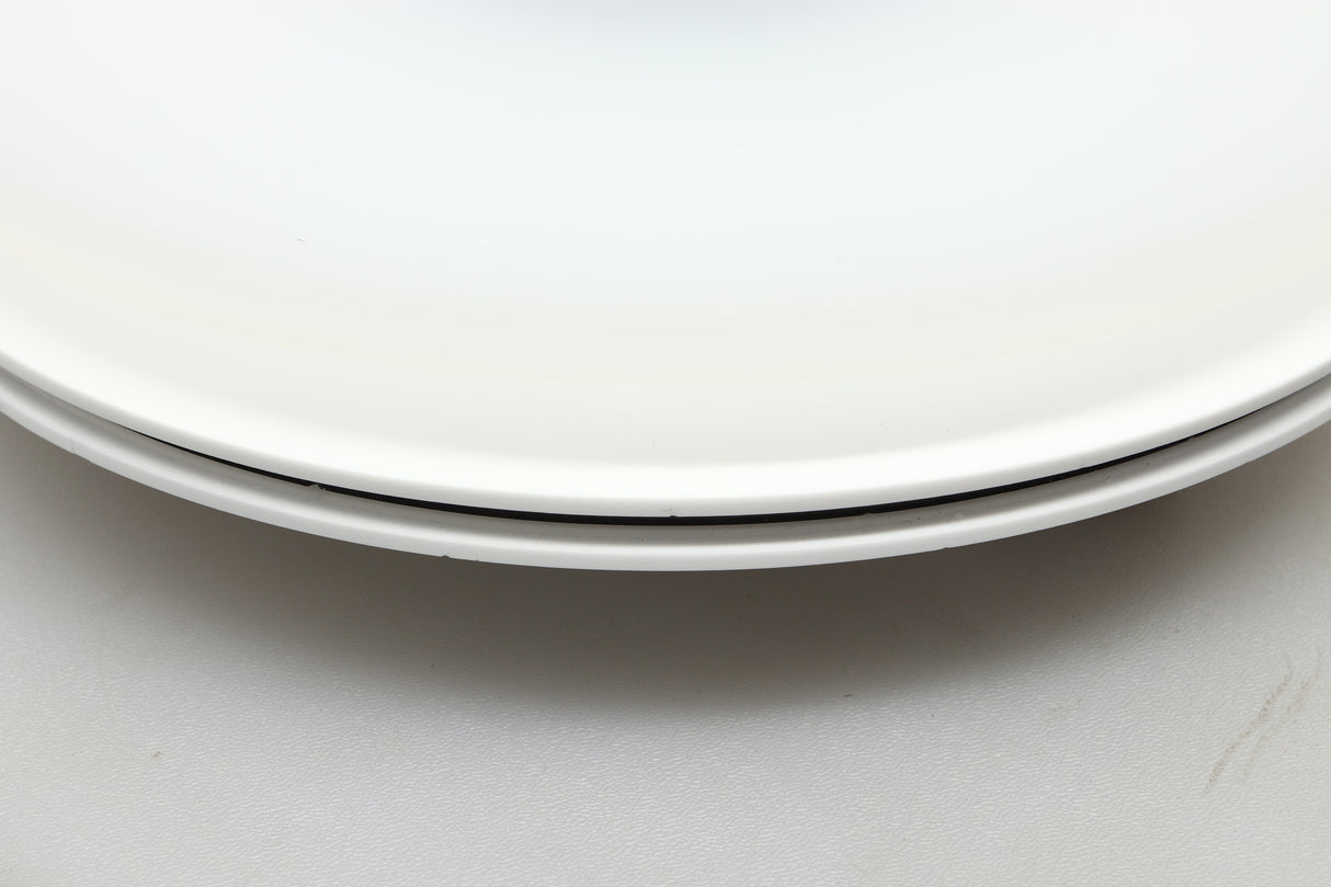 Close up view of a used Edwards Audio Apprentice Turntable in White finish showing some small dents on the side