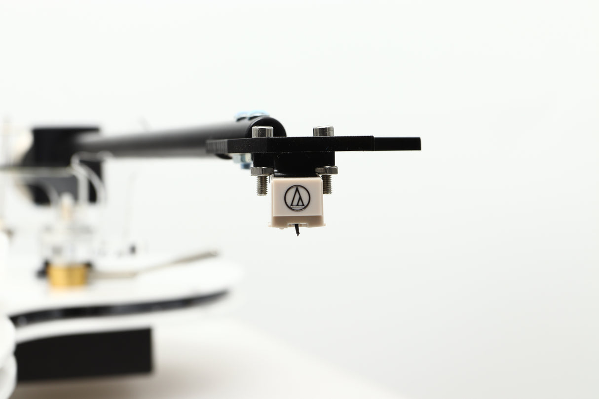 Close up view of a used Edwards Audio Apprentice Turntable in White finish showing the stylus