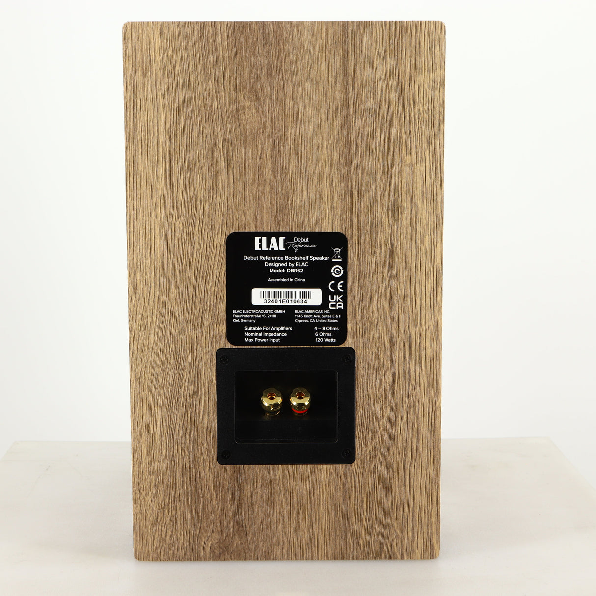 Rear view of a used ELAC DBR62 Standmount Speaker in a light oak finish