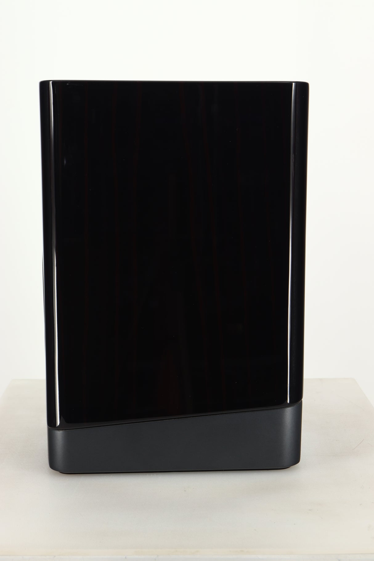 Side view of a used ELAC Navis B51 Active Standmount Speaker in Gloss Ebony Emara finish