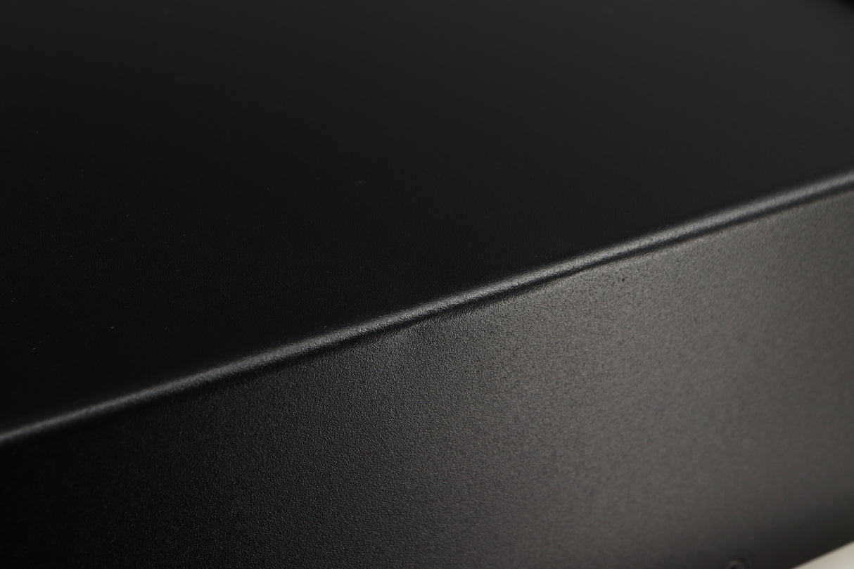 Close up of a used Exposure 3510 Integrated Amplifier in a black finish showing 2 small indents