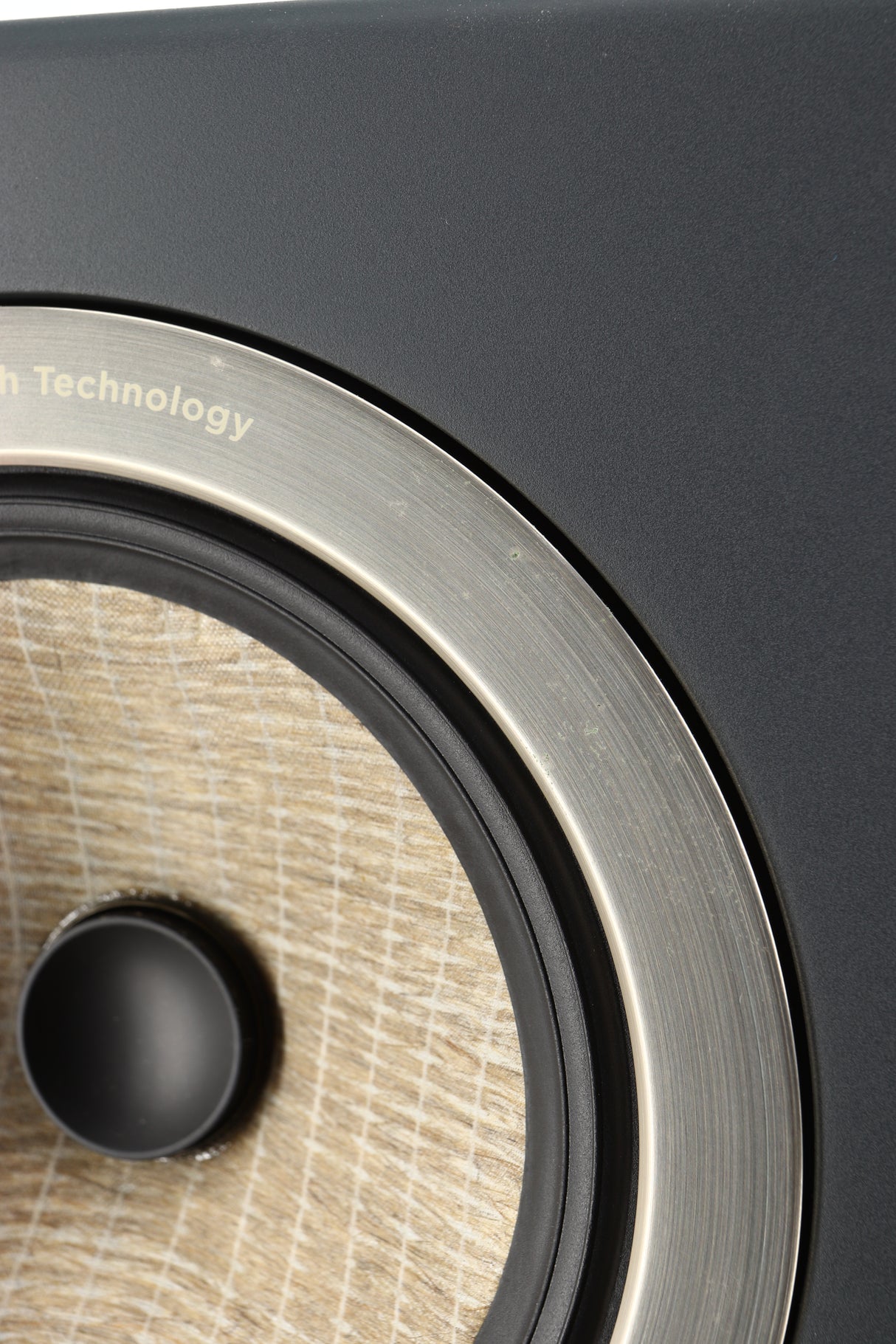 Close up of a used Focal Kanta N2 Floorstanding Speaker in a walnut grey finish showing some marks on metal driver surround