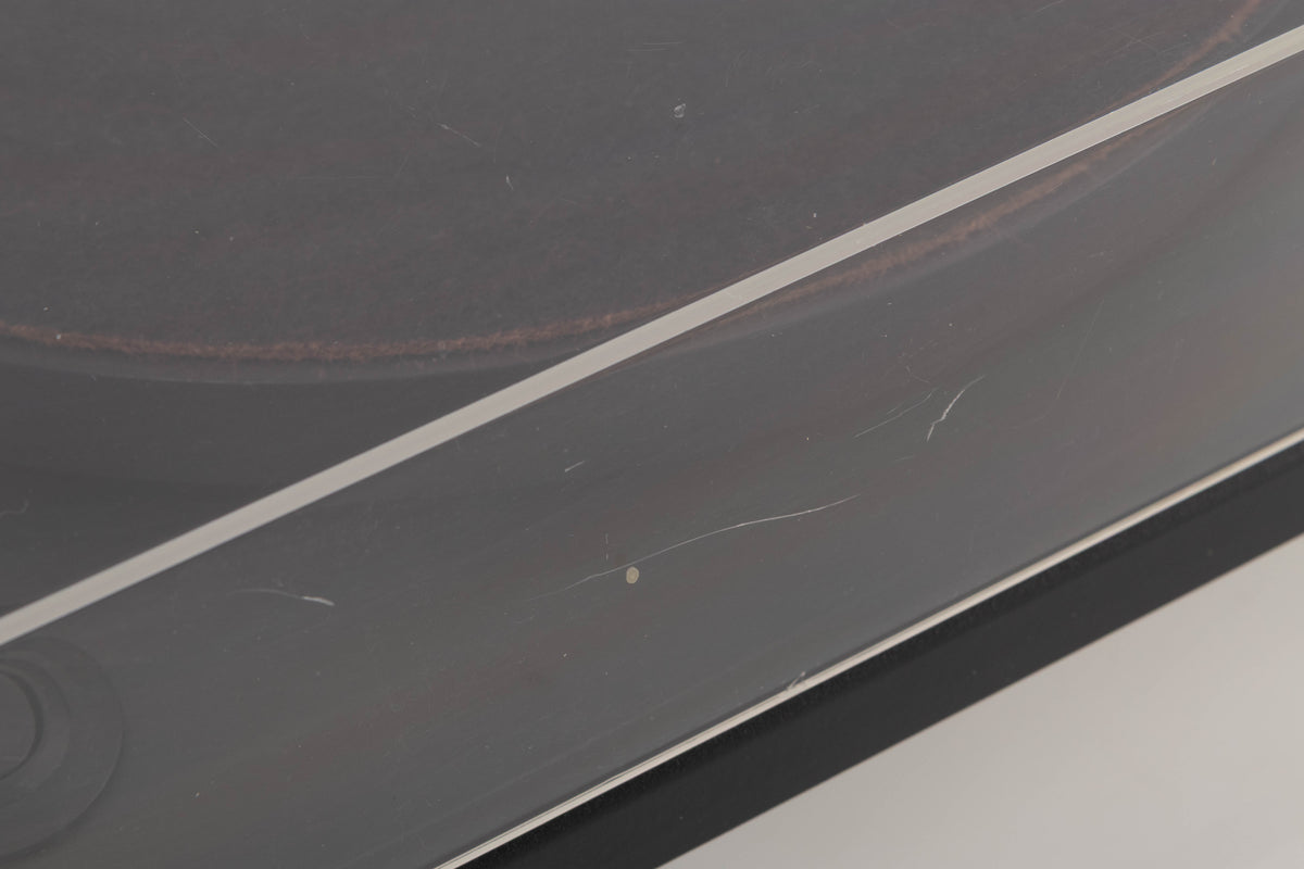 Close up of a used Goldring GR1.2 Turntable W/ Linn Basik Cartridge in a Black finish showing scratches on lid