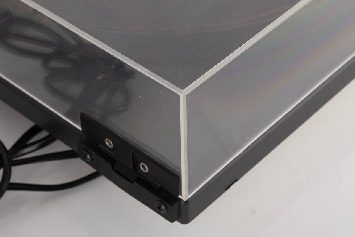 Rear left corner of a used Goldring GR1.2 Turntable W/ Linn Basik Cartridge in a Black finish
