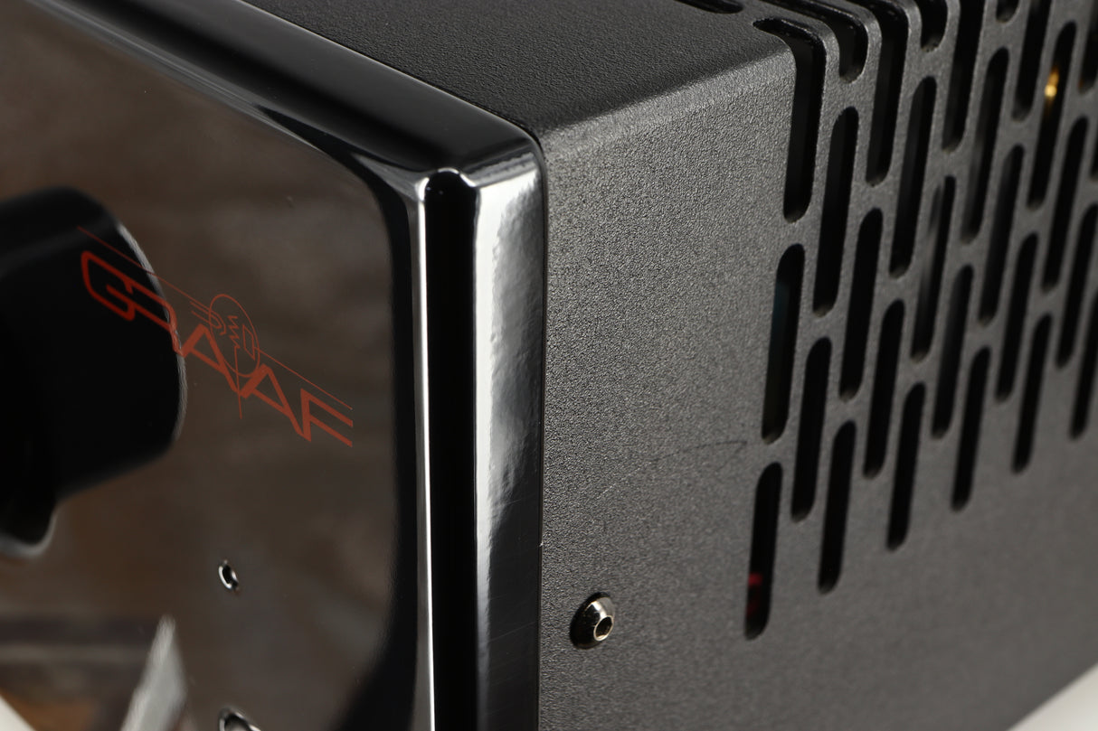 Close up of a used Graaf GM50 Integrated Amplifier in a black finish showing scratch on right side