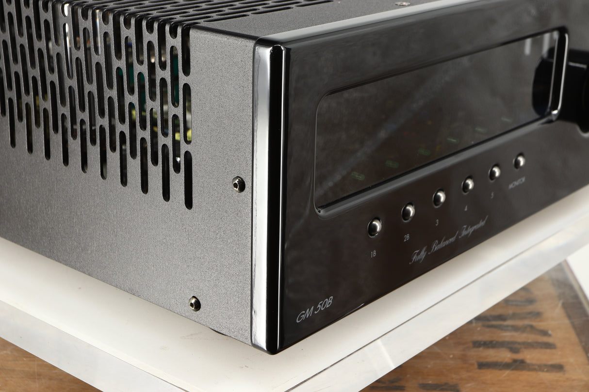 Front left corner of a used Graaf GM50 Integrated Amplifier in a black finish