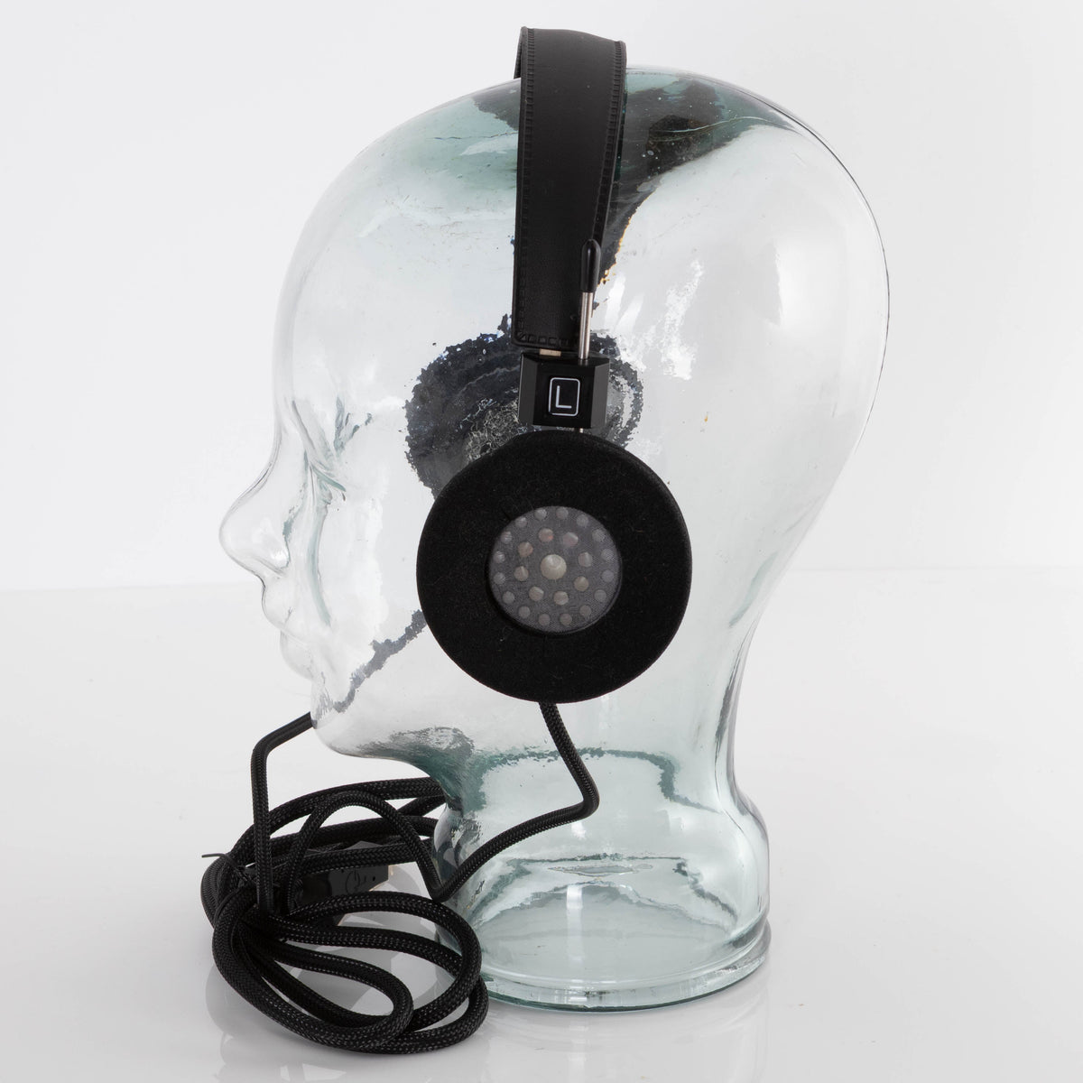 Right side of used Grado SR225X Headphones in a Black finish showing inside of left earmuff