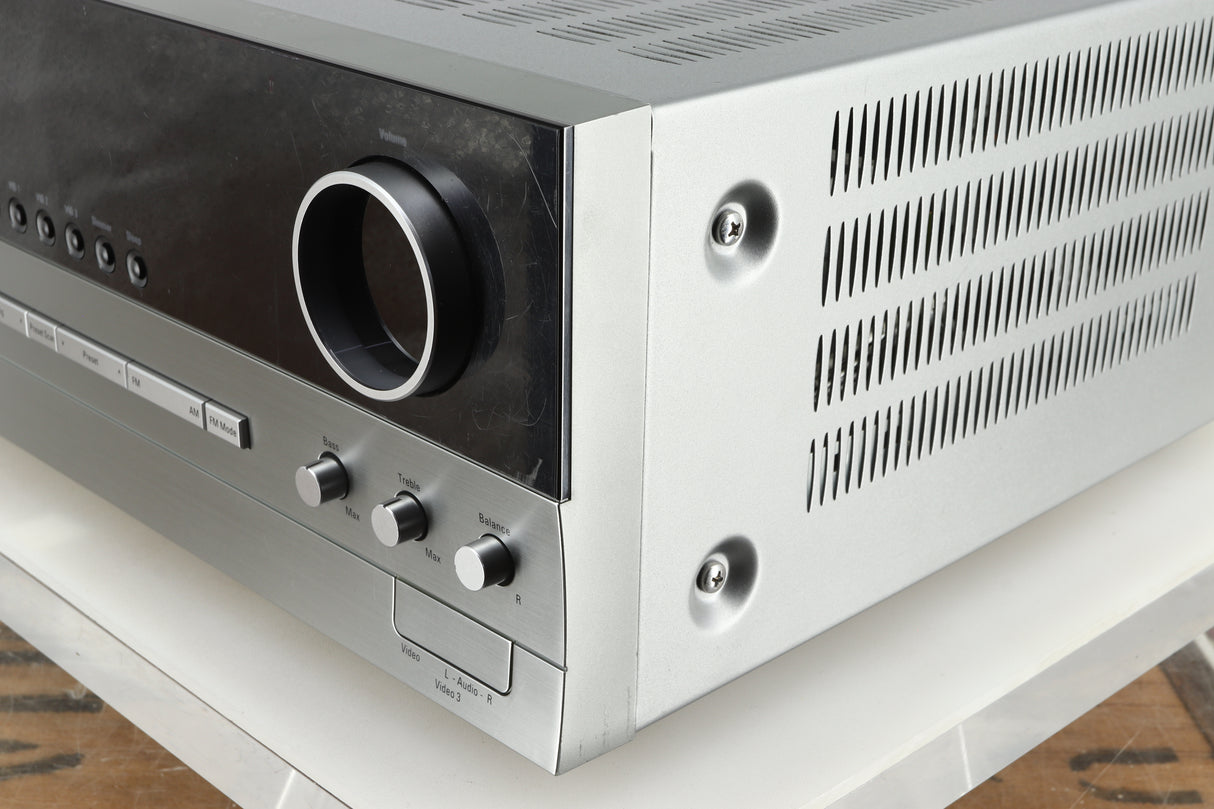 Front right corner of a used Harman Kardon 3380 Receiver in a silver finish