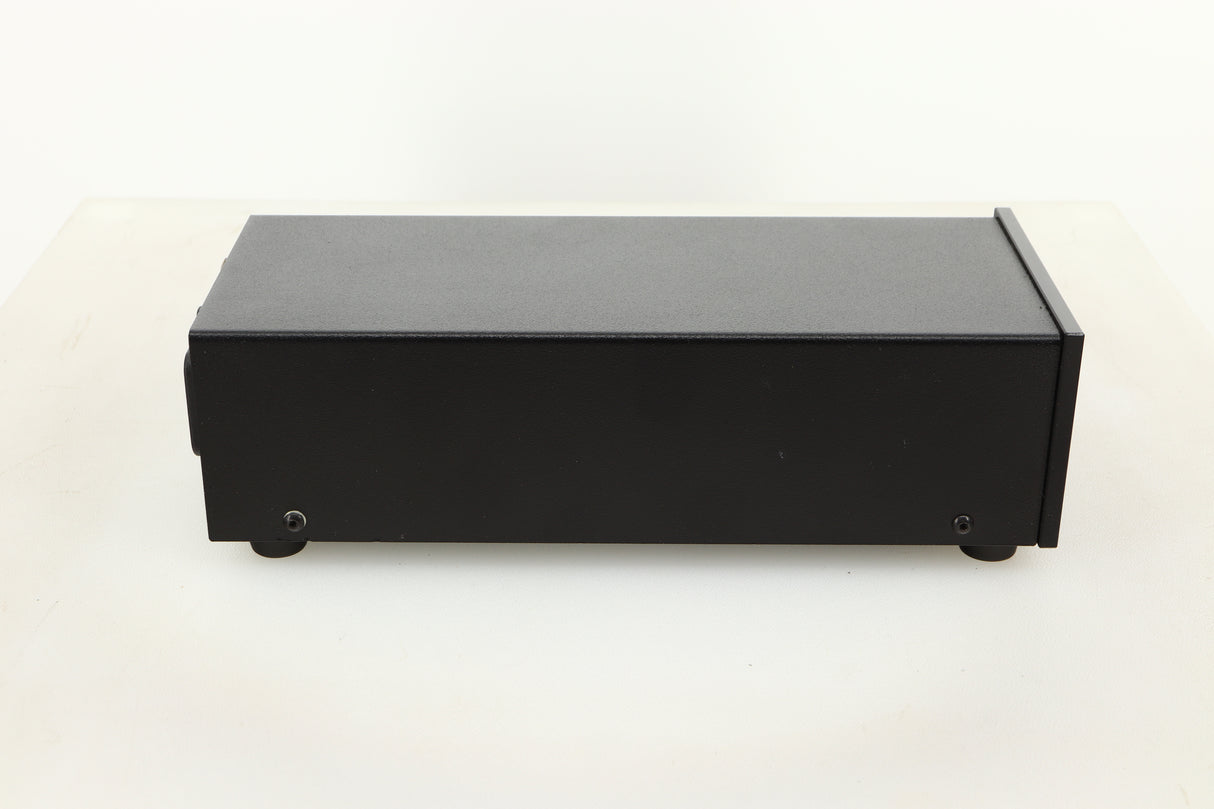 Side view of a used Heed Q-PSU III Power Supply